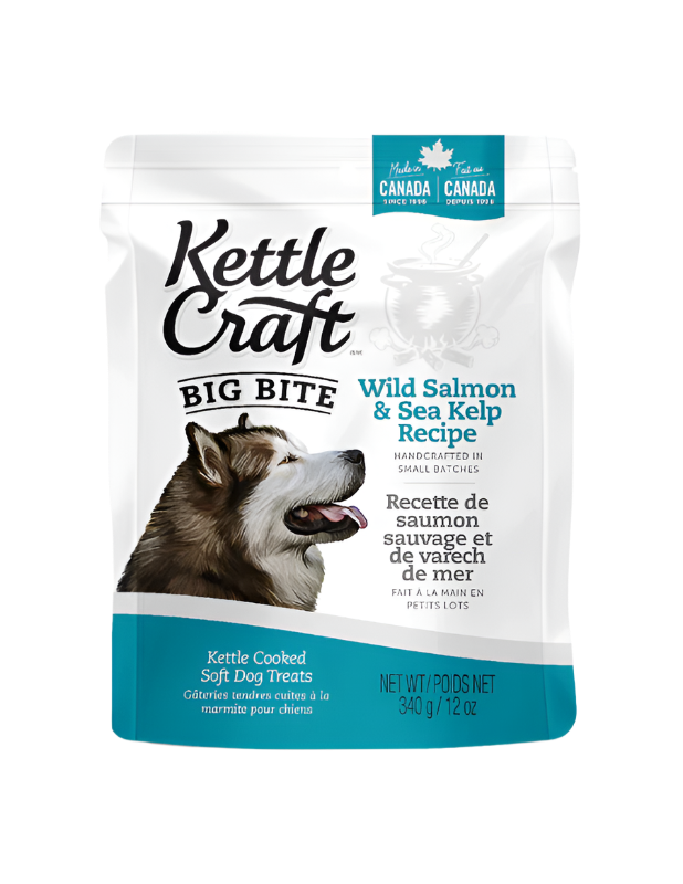 A package of Kettle Craft Small Bites dog treats with Wild Salmon & Sea Kelp Recipe. The packaging is predominantly white with an image of a dog on the front and text detailing the product.