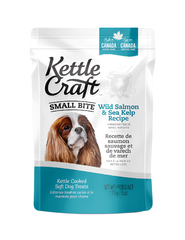 A package of Kettle Craft Small Bites dog treats with Wild Salmon & Sea Kelp Recipe. The packaging is predominantly white with an image of a dog on the front and text detailing the product.