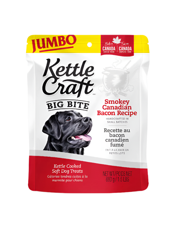 A package of Kettle Craft Small Bite Dog Treats with Smokey Canadian Bacon flavor. The package is predominantly white, with images of the product and a dog on the front.